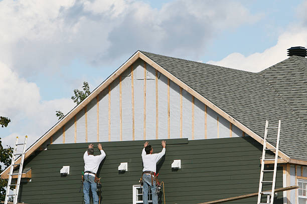 Professional Siding Contractor technician working in Hightstown, NJ